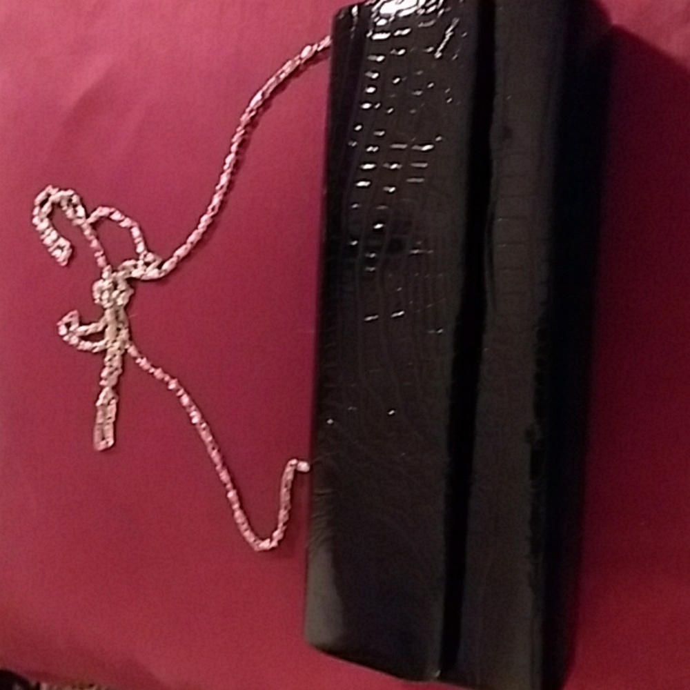 A patent evening bag